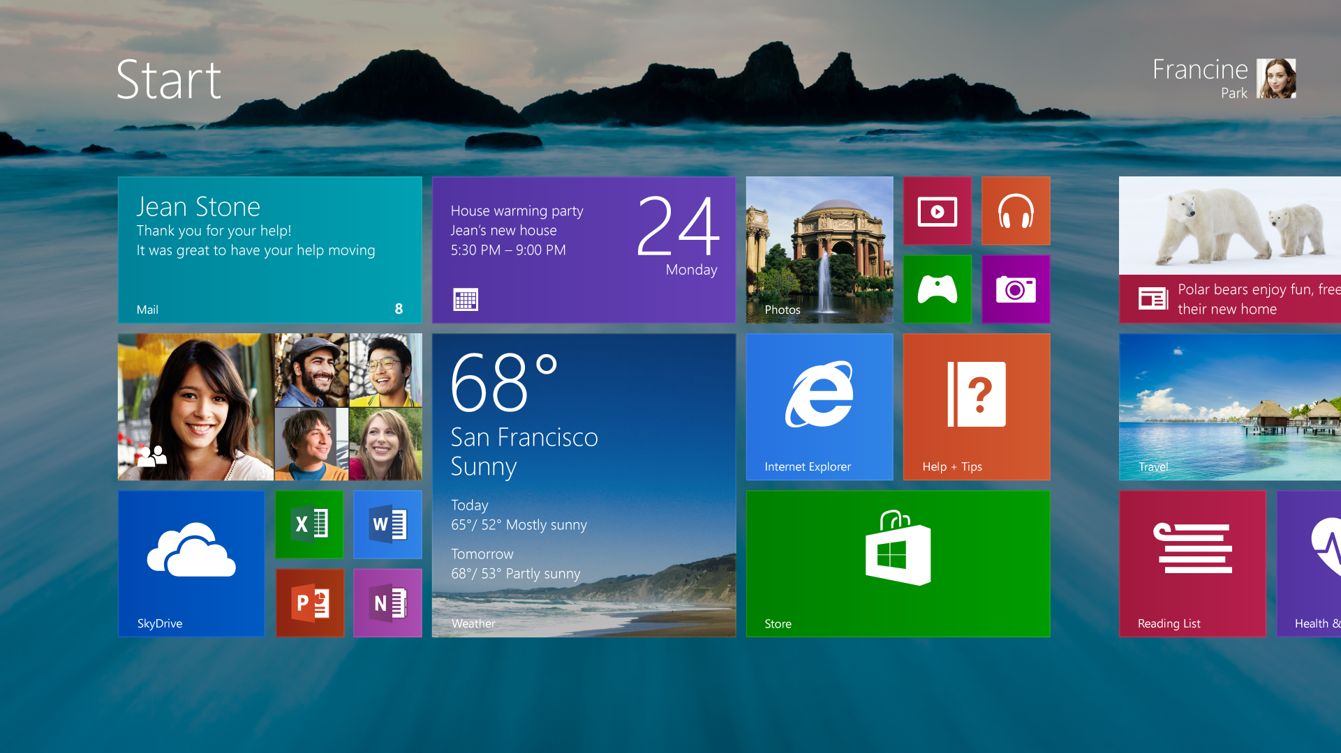 Windows 8.1 Pre-release Start screen with desktop background