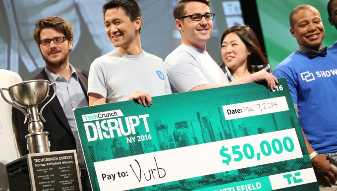The Vurb team, including CEO Bobby Lo (second from left) celebrate their TechCrunch Disrupt Battlefield 2014 win