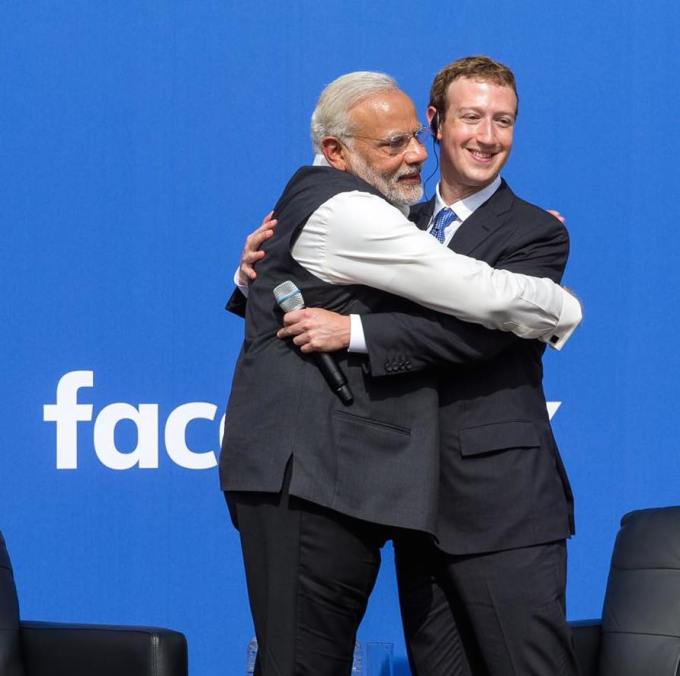 Zuckerberg embraces India's Prime Minister Narendra Modi, a Hindu