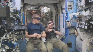 Astronaut Scott Kelly (right) testing out Microsoft HoloLens on ISS / Courtesy of NASA