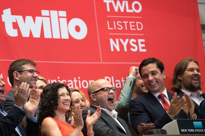 NEW YORK, NY - JUNE 23: Twilio Inc. founder and CEO Jeff Lawson (C, in glasses) reacts after ringing the opening bell to celebrate Twilio's initial public offering, at the New York Stock Exchange, June 23, 2016 in New York City. Financial markets are bracing for the outcome of Thursday's historic 'Brexit' referendum, where Britons will head to the polls to decide whether the United Kingdom should remain in the European Union. (Photo by Drew Angerer/Getty Images)