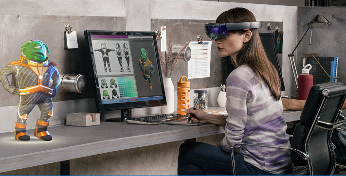 Woman working on robot design using Microsoft Hololens.