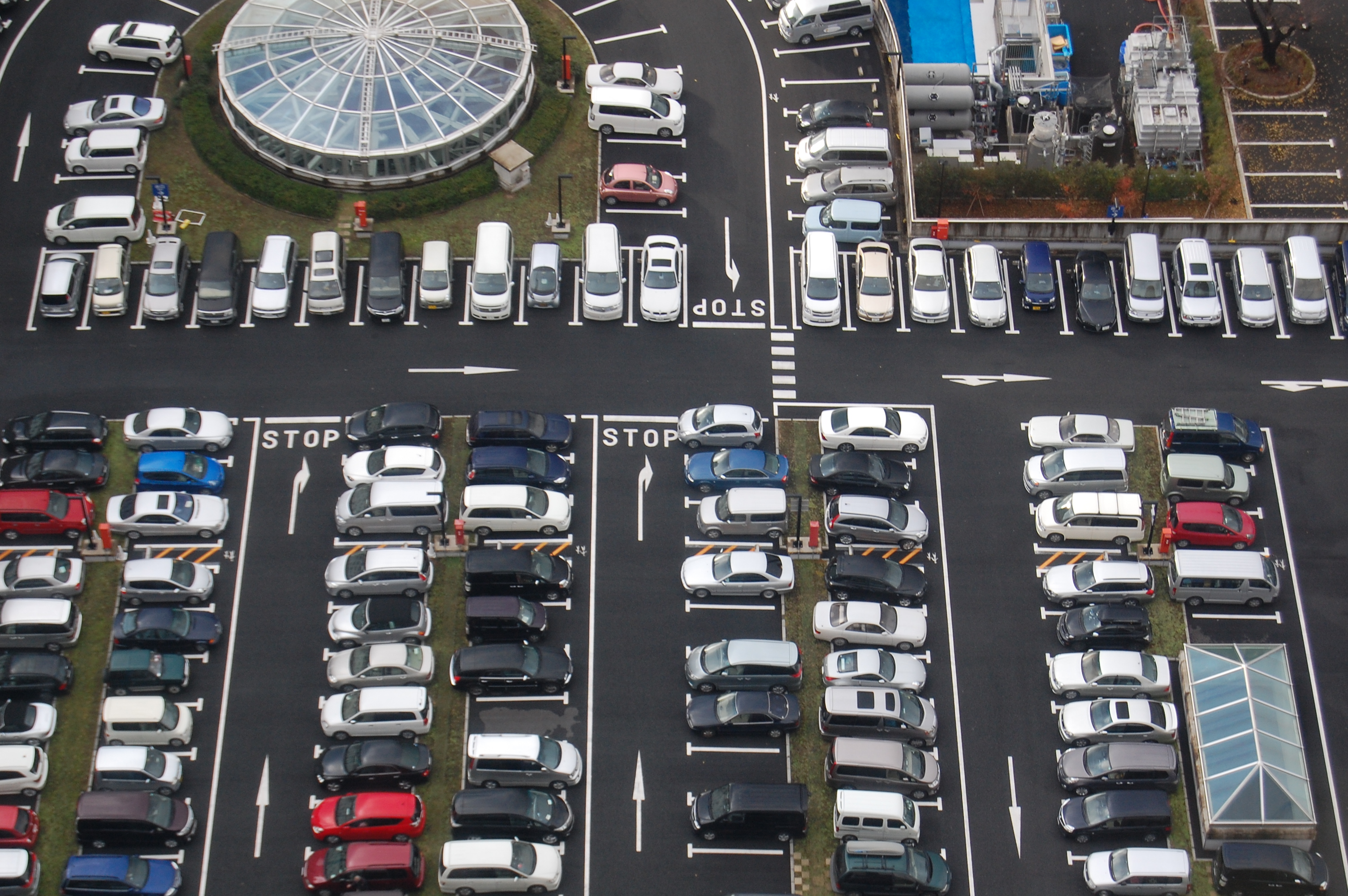 Parking lots like this one in Tokyo currently take up vast tracts of otherwise useless urban space, argues Lyft.