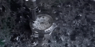 Because, frankly, if you have a waterjet, why wouldn't you cut a knockoff Rolex in half?