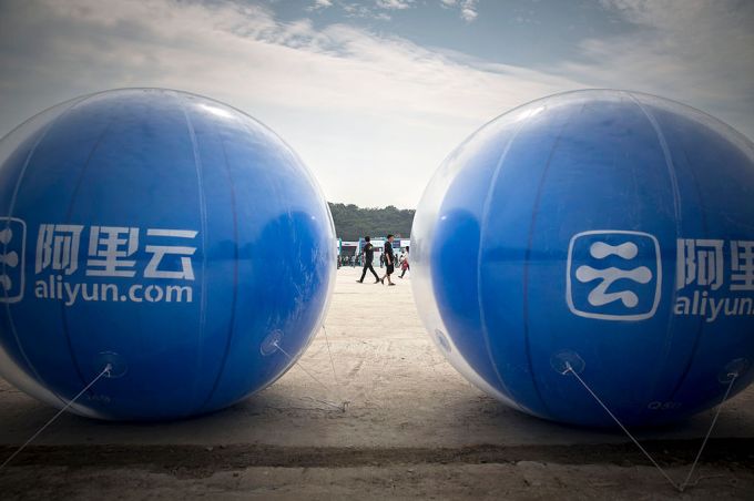 Giant balloons promoting AliCloud, the cloud-computing arm of Alibaba Group Holding Ltd., stand on display at the 2015 Computing Conference in Hangzhou, China, on Wednesday, Oct. 14, 2015. Alibaba's bet on data technology is driving greater investment in areas including ways to protect user privacy as it battles Amazon.com Inc. for customers globally. Photographer: Qilai Shen/Bloomberg via Getty Images